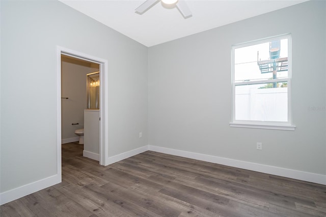 unfurnished room with hardwood / wood-style flooring and ceiling fan