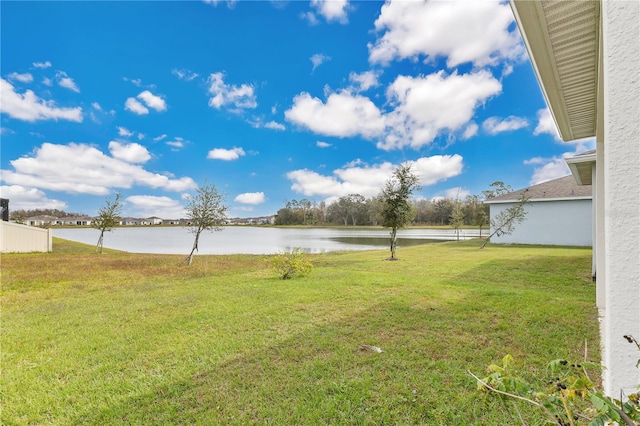 view of yard with a water view