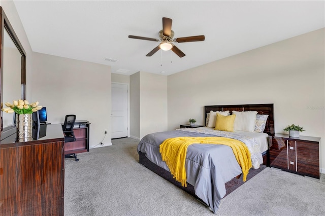 bedroom with ceiling fan and light colored carpet