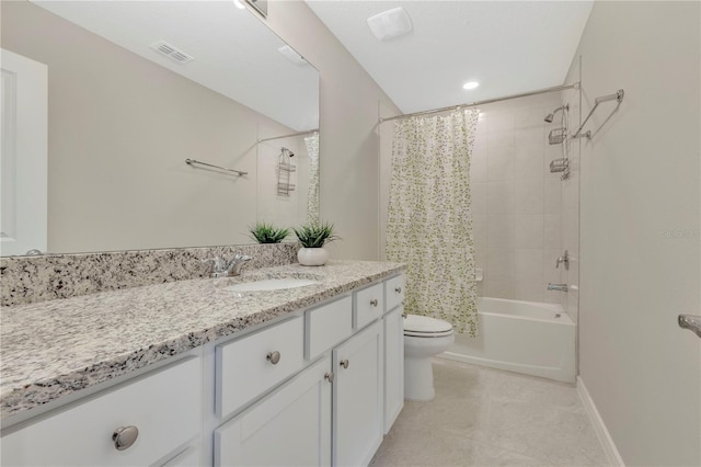 full bathroom with toilet, vanity, and shower / bath combo