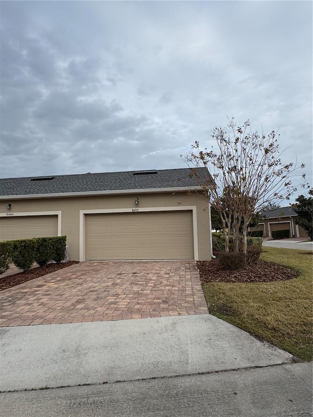 exterior space with a garage