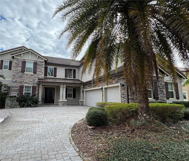 view of front of property featuring a garage