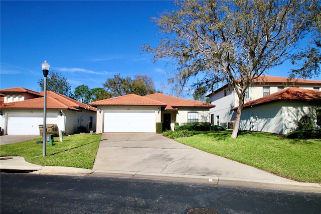 view of front of home featuring a front lawn and a garage