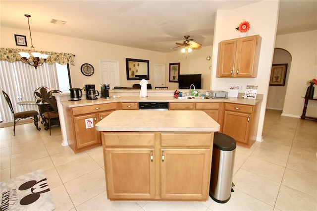 kitchen with sink, decorative light fixtures, a kitchen island, and ceiling fan with notable chandelier