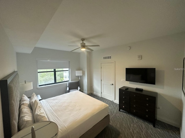 carpeted bedroom featuring ceiling fan