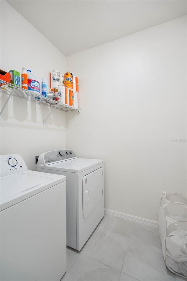 laundry area featuring washing machine and dryer