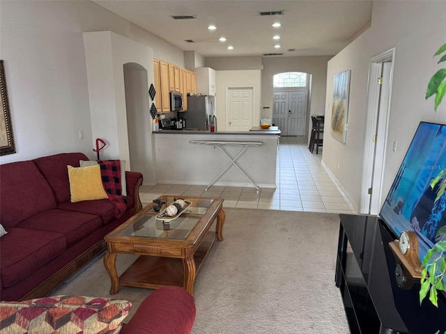 living room featuring light colored carpet