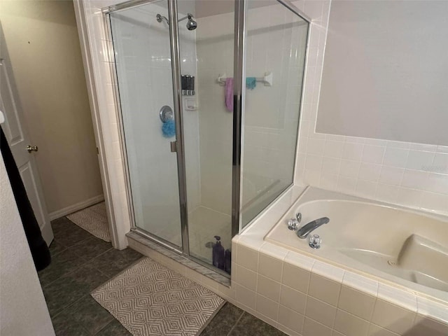 bathroom featuring shower with separate bathtub and tile patterned floors