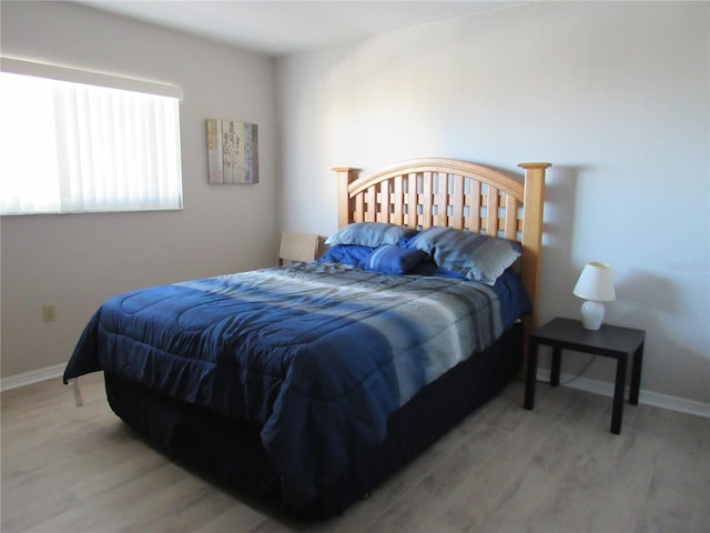 bedroom featuring hardwood / wood-style floors