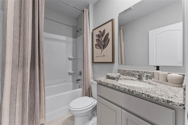 full bathroom with shower / bathtub combination with curtain, tile patterned flooring, a textured ceiling, toilet, and vanity