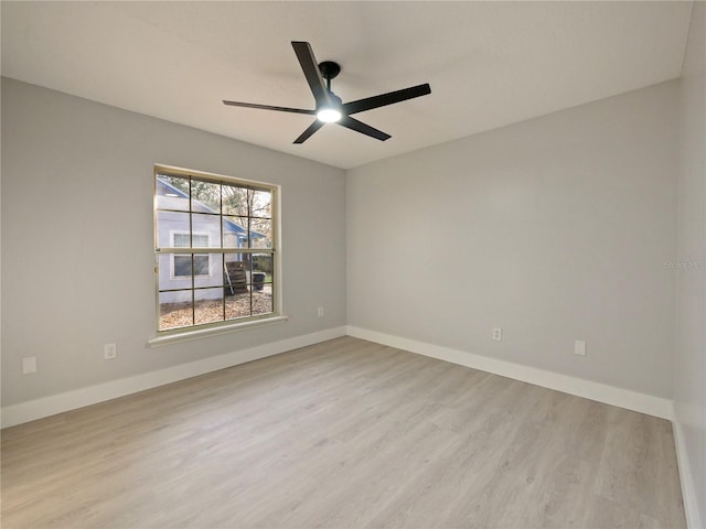 unfurnished room featuring ceiling fan and light hardwood / wood-style floors