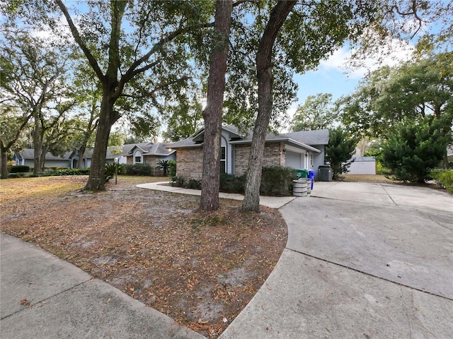 single story home featuring a garage