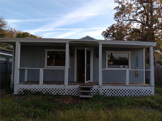 718 New York St, Clearwater, FL 33756 - view of front facade with a porch
