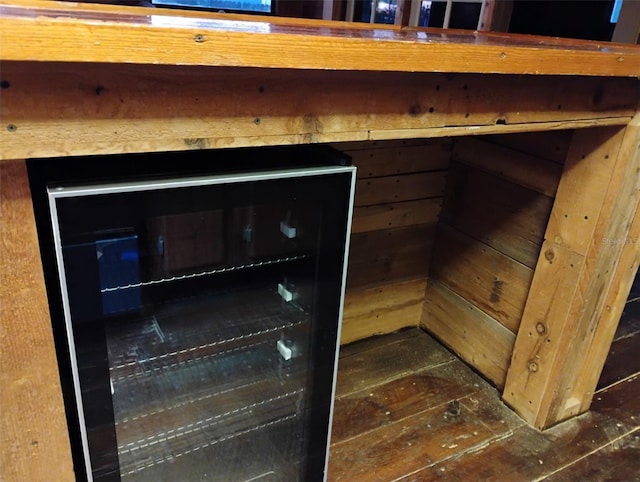 718 New York St, Clearwater, FL 33756 - detailed view of wood finished floors and wine cooler