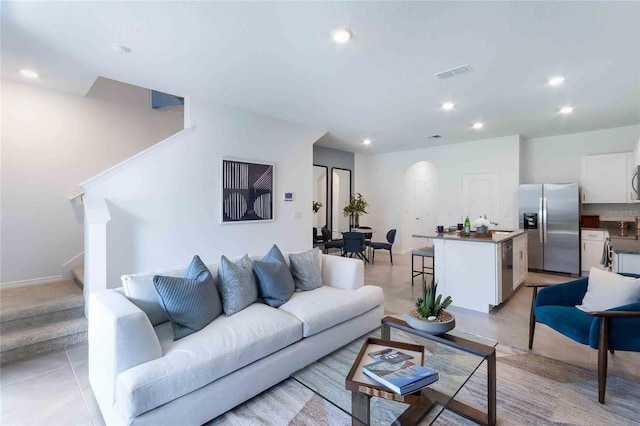 living room featuring light tile patterned flooring