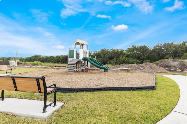 view of jungle gym featuring a yard