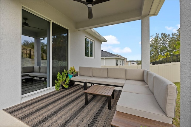 exterior space featuring ceiling fan and an outdoor hangout area