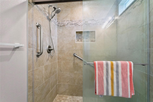 full bathroom with a shower stall