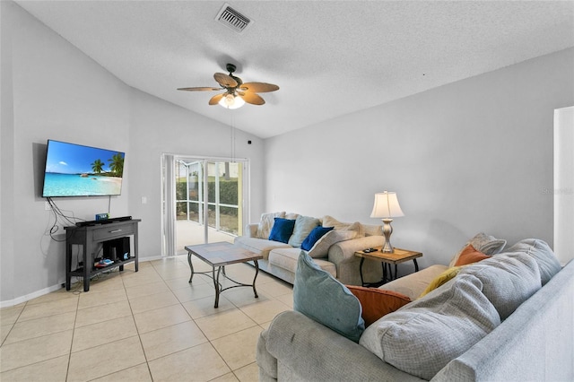 living area with visible vents, a textured ceiling, light tile patterned flooring, ceiling fan, and vaulted ceiling