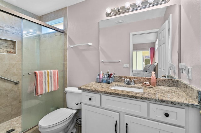 1685 Waterview Loop, Haines City, FL 33844 - ensuite bathroom featuring ensuite bath, a shower stall, and toilet
