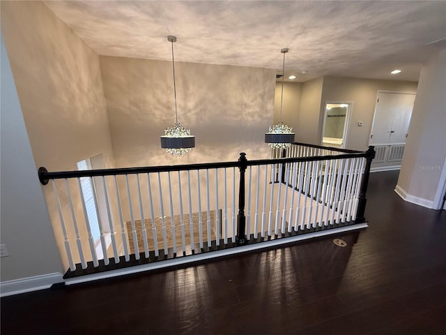 staircase featuring wood-type flooring