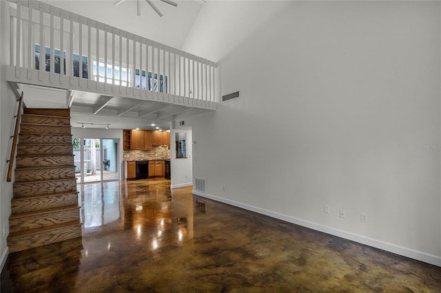 living room featuring ceiling fan and concrete floors