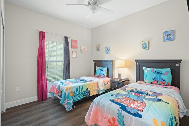 bedroom featuring ceiling fan and dark wood-type flooring