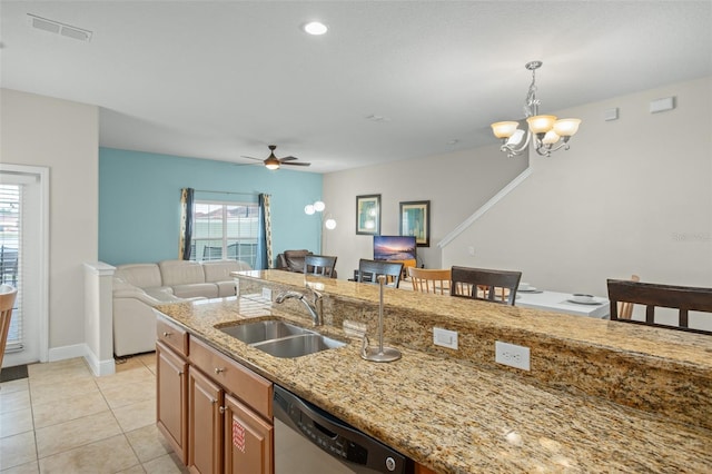 kitchen with ceiling fan with notable chandelier, sink, stainless steel dishwasher, decorative light fixtures, and light tile patterned flooring