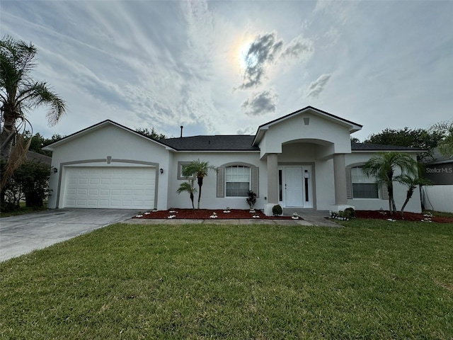 single story home with a front lawn and a garage