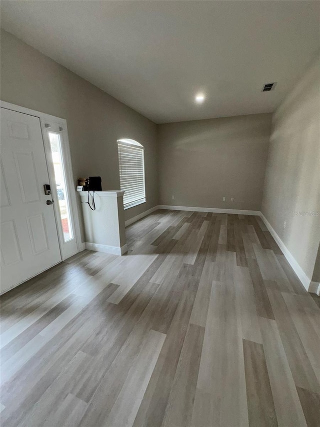 entrance foyer with light hardwood / wood-style flooring