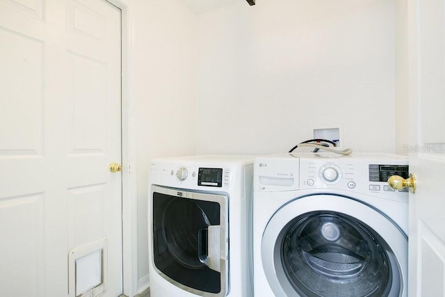 905 Hatteras Ave, Minneola, FL 34715 - laundry room featuring washing machine and dryer