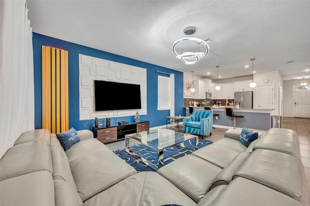 living room with a textured ceiling