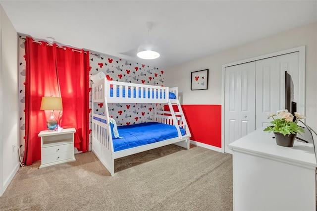 bedroom with a closet and carpet