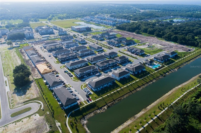 bird's eye view with a water view