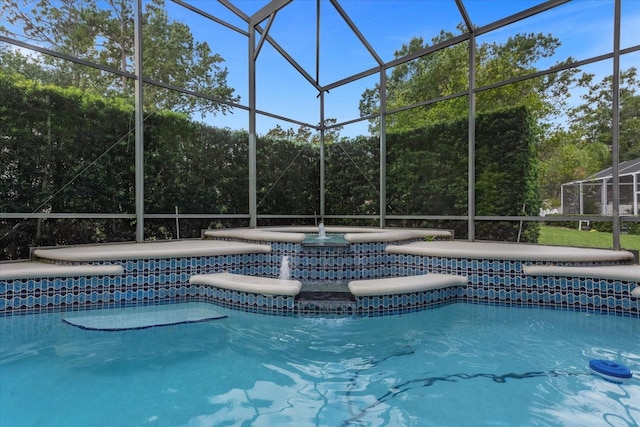 view of swimming pool with glass enclosure