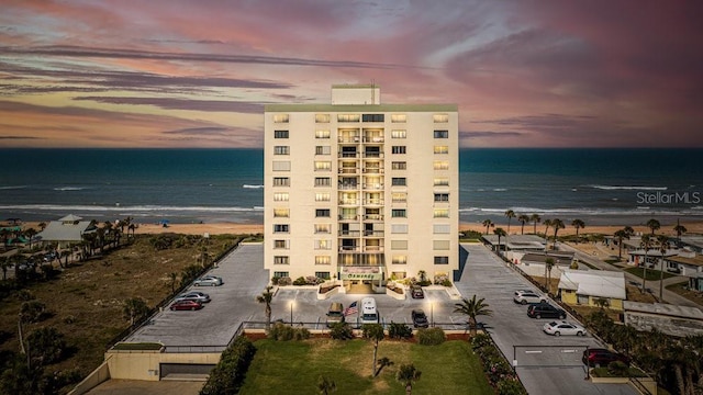 outdoor building at dusk with a water view