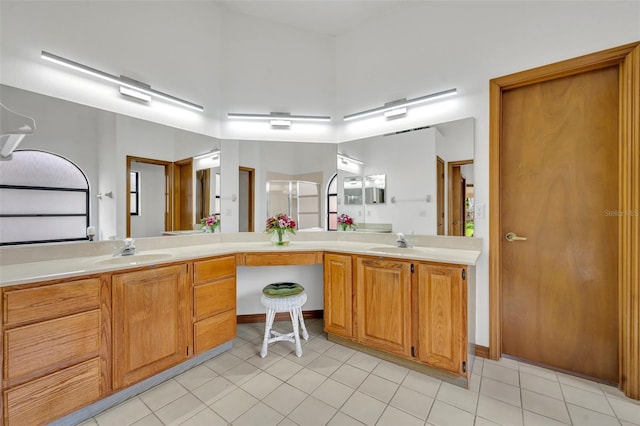 bathroom with vanity and tile patterned floors