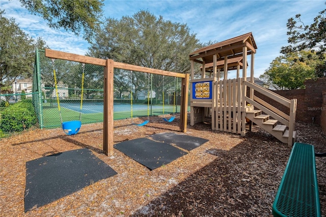 view of playground with tennis court