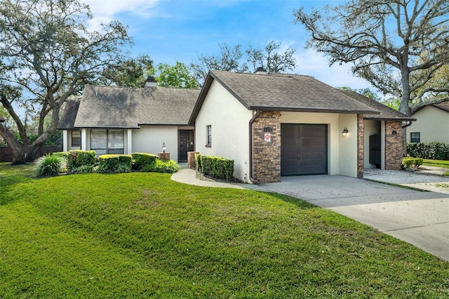 view of front of home with stucco siding, roof with shingles, concrete driveway, a front yard, and a garage