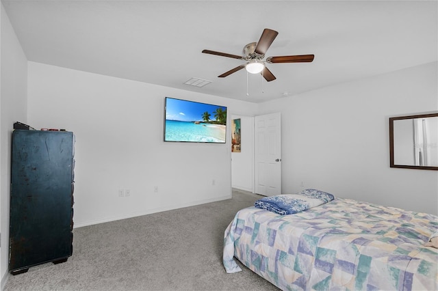 bedroom featuring ceiling fan and light carpet