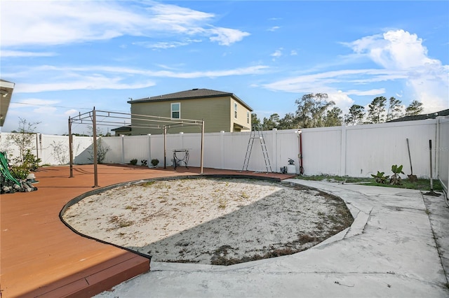 view of yard with a wooden deck