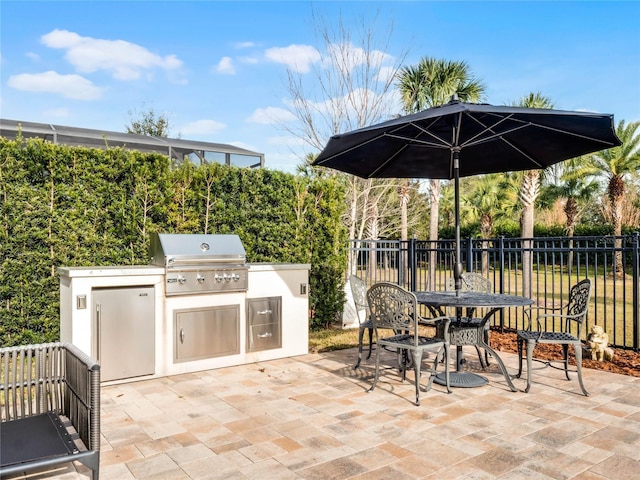 view of patio featuring a grill and area for grilling