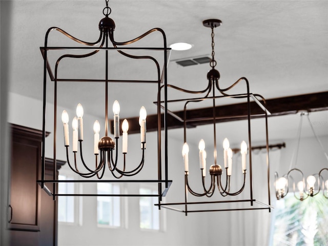 details with an inviting chandelier