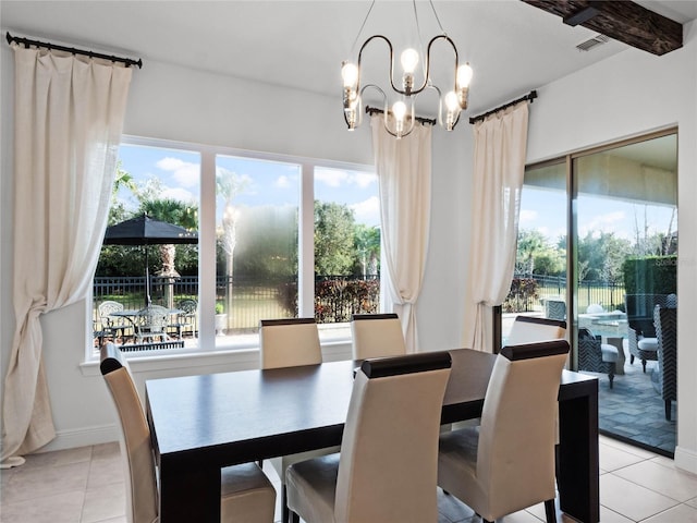 tiled dining space featuring beamed ceiling and a notable chandelier