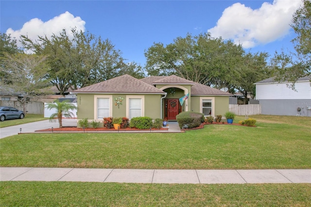 view of front of property with a front yard