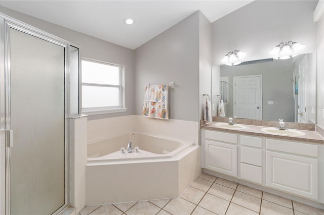 bathroom featuring vanity, tile patterned floors, and independent shower and bath