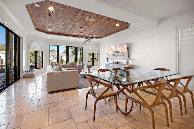 dining space featuring crown molding, recessed lighting, a raised ceiling, stone tile flooring, and wood ceiling