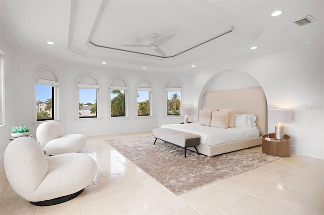 bedroom with baseboards, visible vents, ornamental molding, a tray ceiling, and recessed lighting