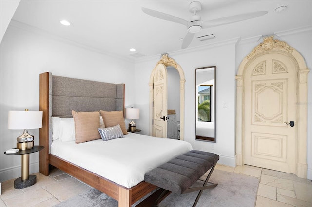 bedroom with stone tile floors, baseboards, crown molding, and recessed lighting