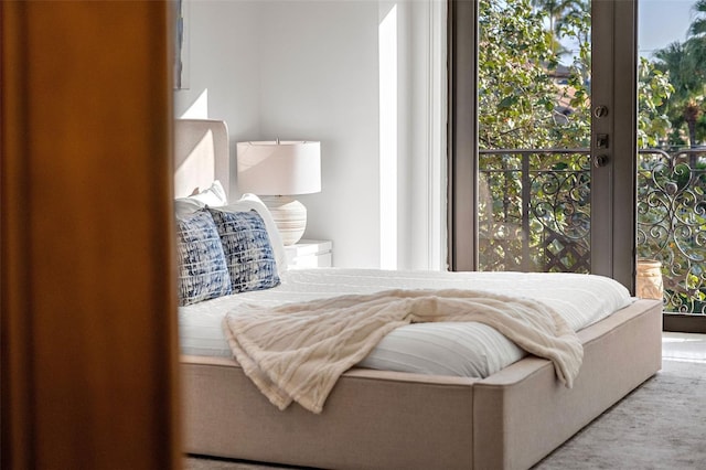 bedroom featuring multiple windows